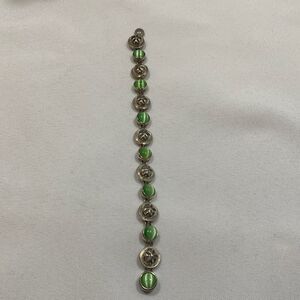 Beautiful silvertone/green stone magnetic closure bracelet.